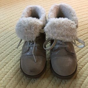 Little girl fur lined lace up boots.